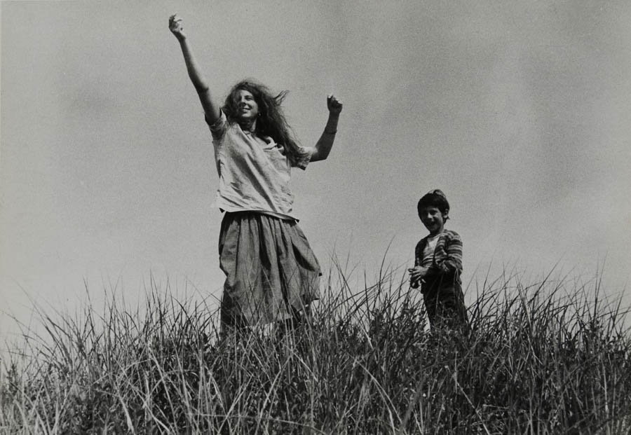 Mary and Pablo in high grass circa 1956 by Robert Frank born 1924